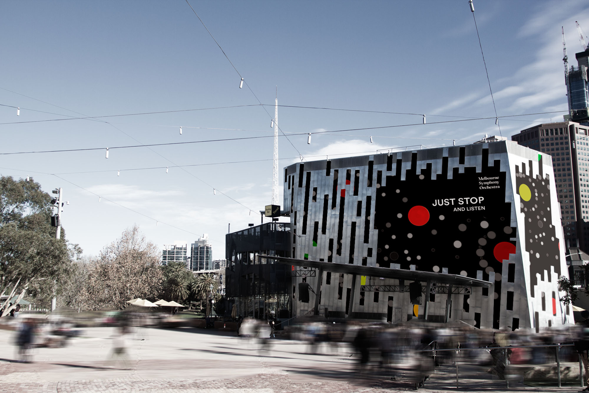 A wide shot of Fed Square in Victoria, Melbourne with a sound installation projection