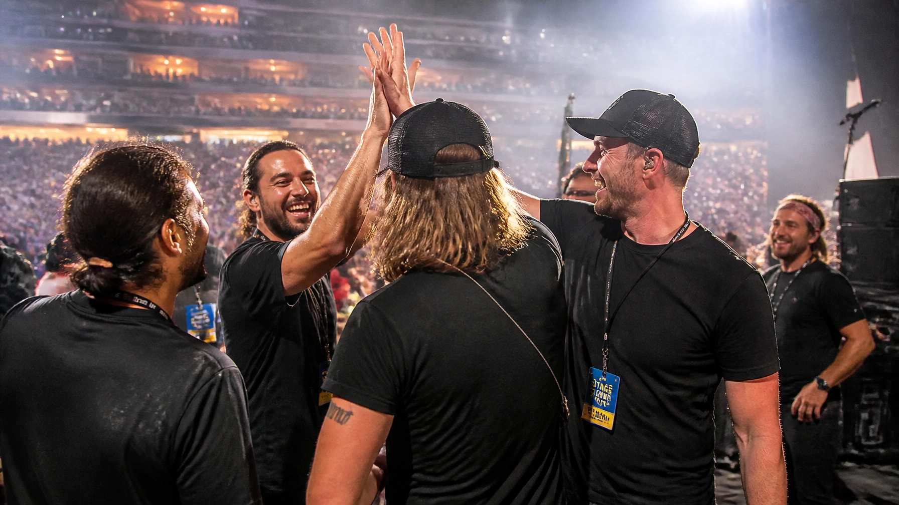Successful event organizers celebrating a sold-out show