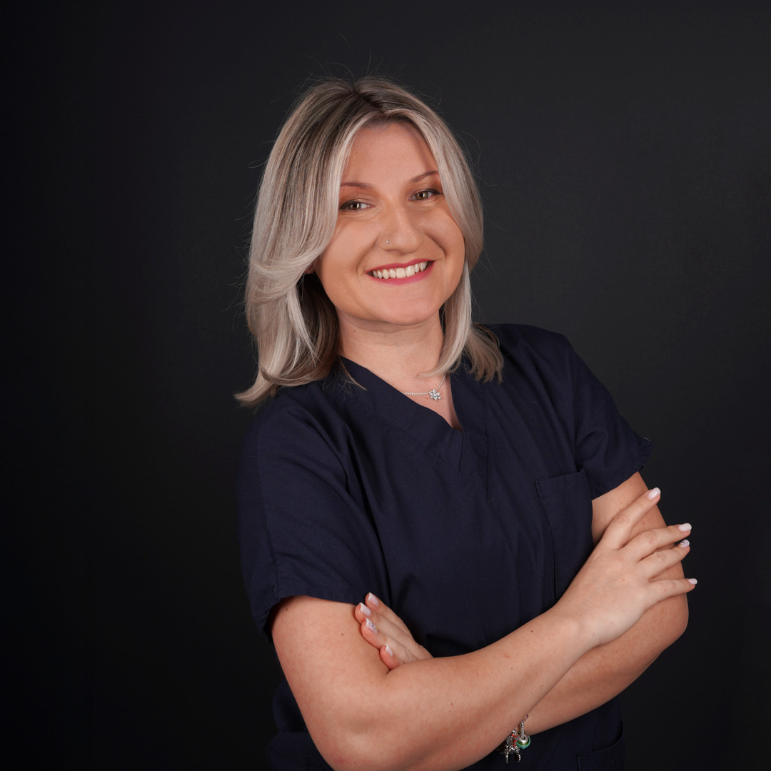 Dr. Merli Teodora