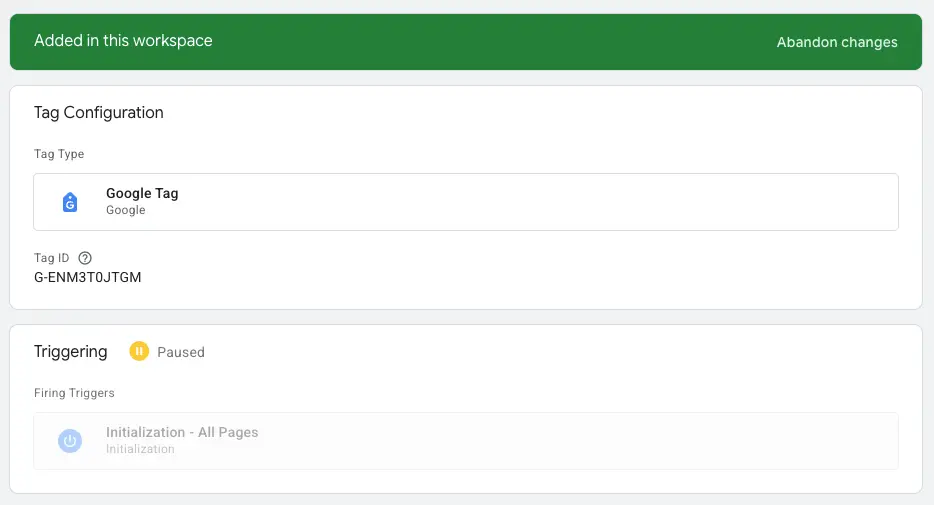Google Tag Manager workspace showing a Google Tag configuration with Tag ID and a paused trigger setup.