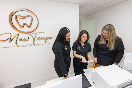 Team smiling after a dental bonding treatment at New Tempo Family Dental in Tempe and Phoenix, AZ