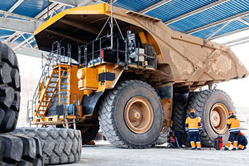 Mining maintenance teams working on a mine truck using Obzervr as their digital work execution solution 