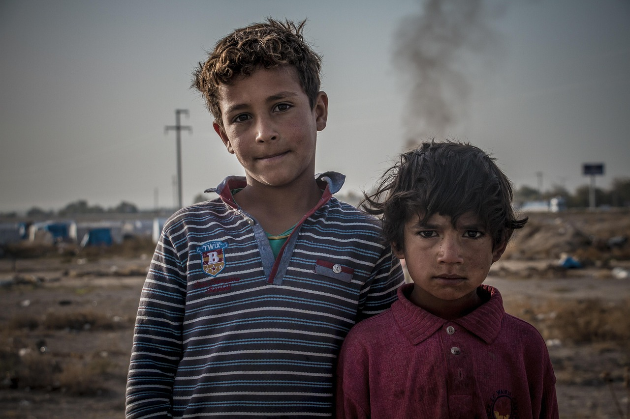 Children struggling for food in a conflict-stricken land