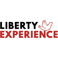 Logo of Liberty Experience e.V. featuring bold black and red text with a dove symbol representing peace and freedom.