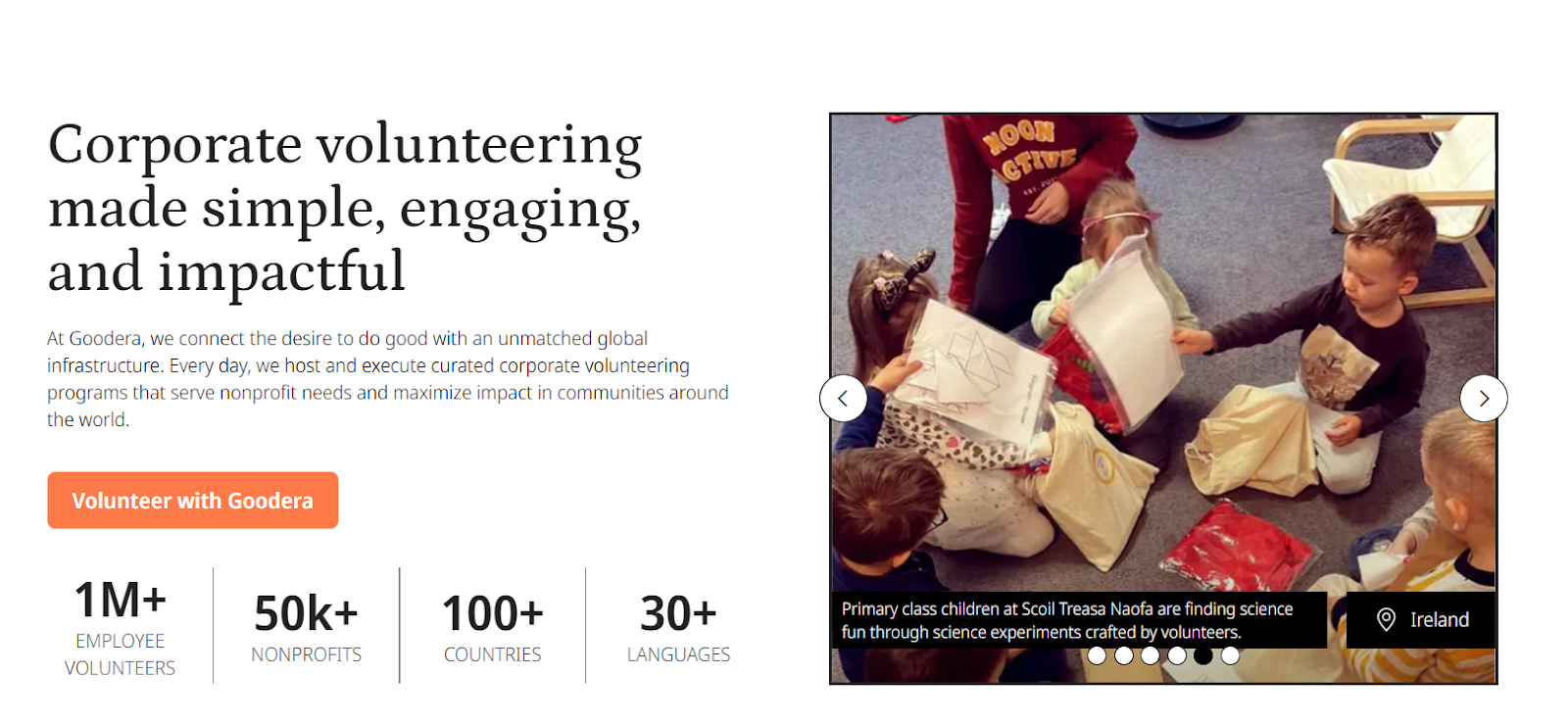 Goodera corporate volunteering banner featuring children participating in a classroom activity alongside volunteers.