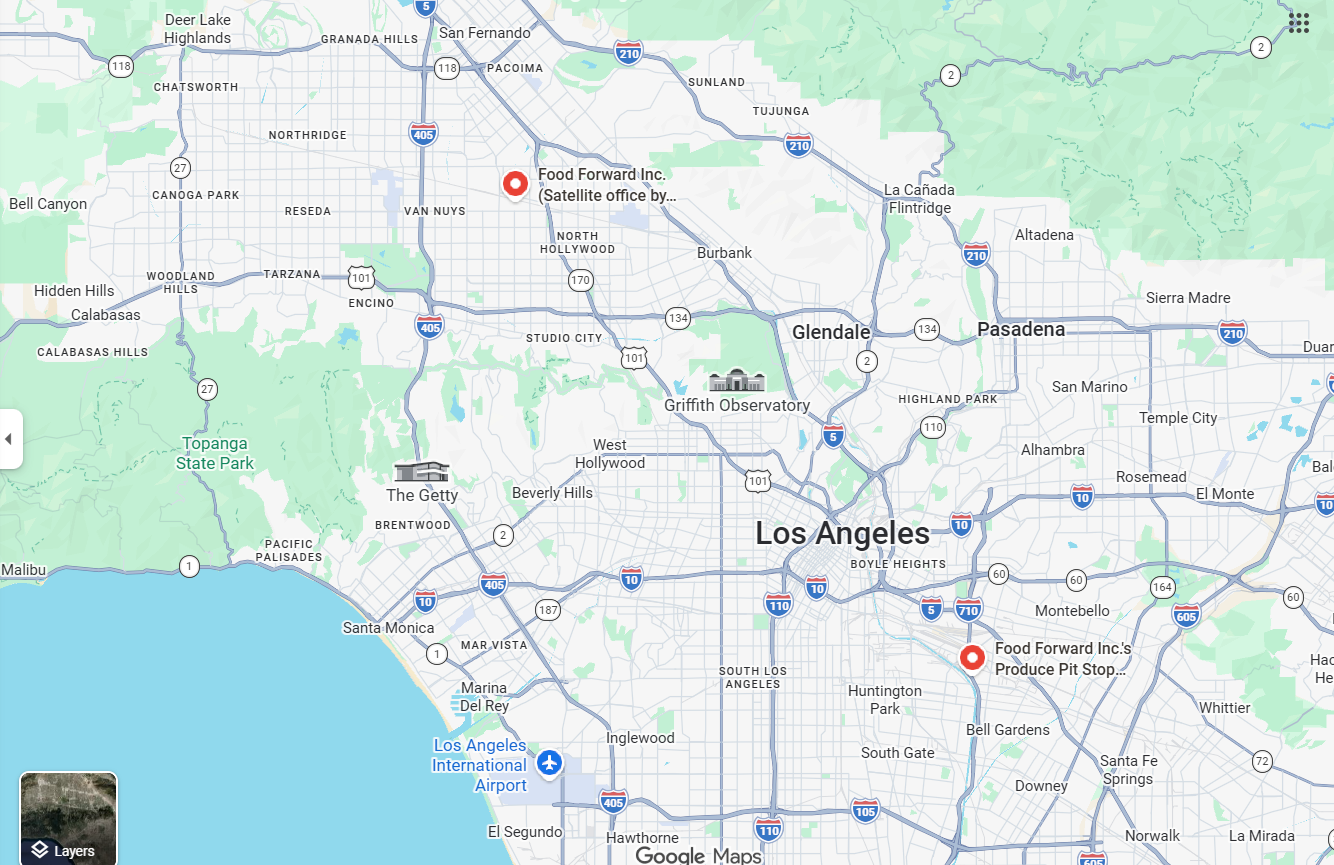 Volunteers harvesting produce for Food Forward