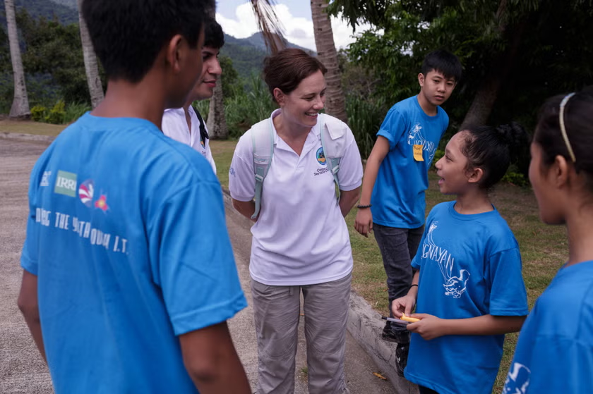 IBM Service Corps interacting with children