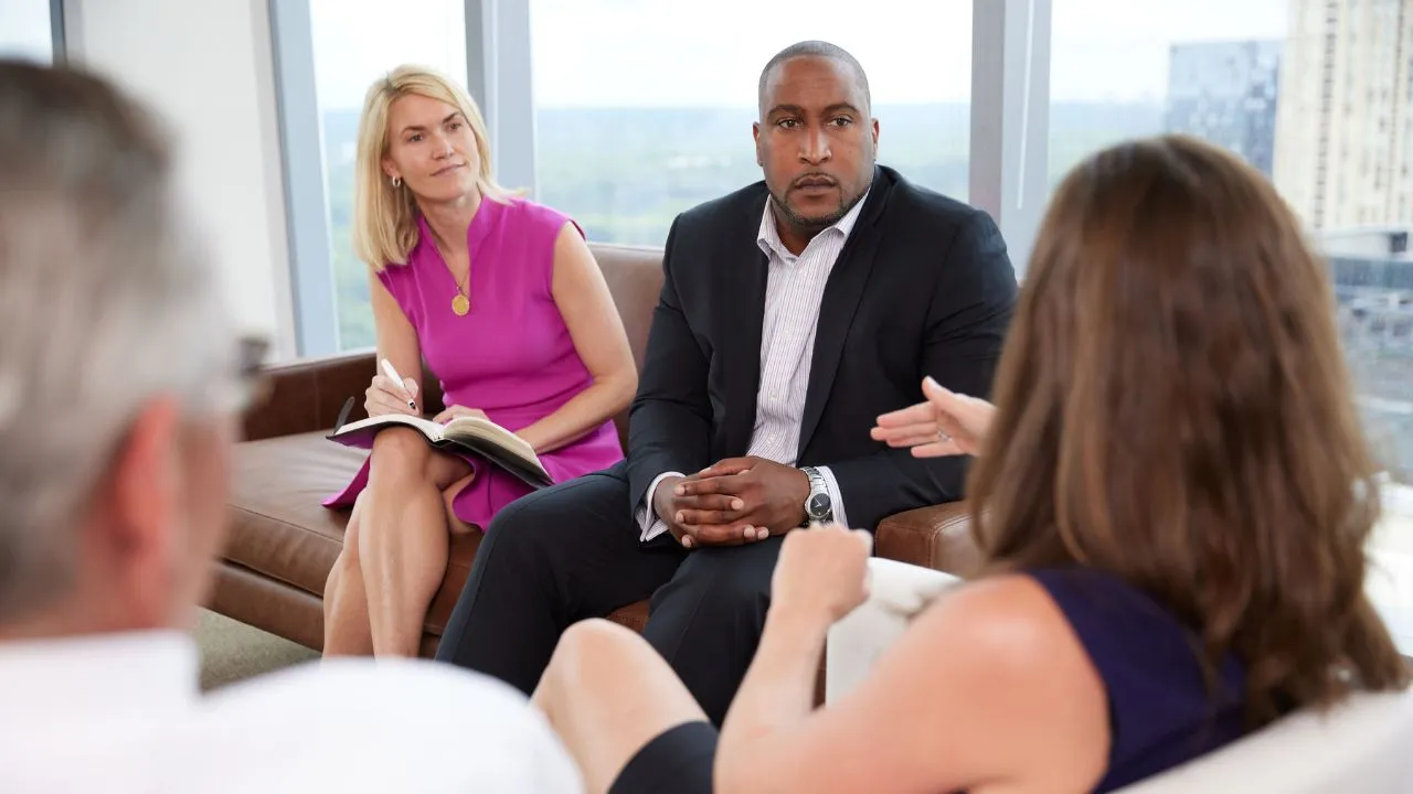 Balentine Relationship Manager helps family with financial planning in meeting