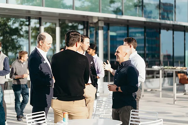 People conversing on a patio