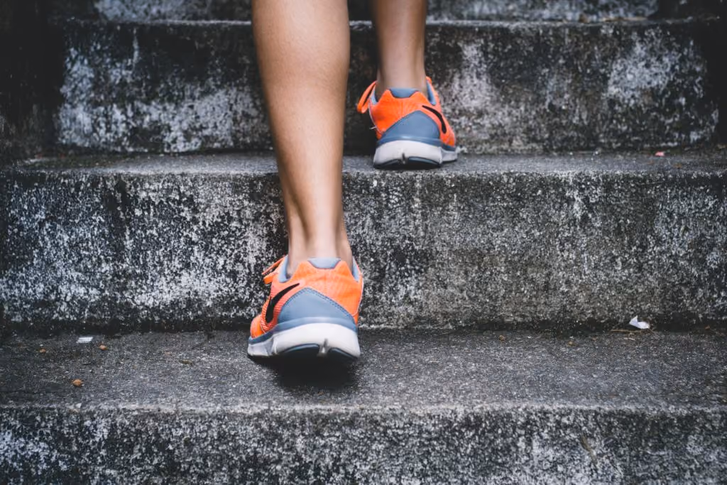 Close up on person walking stairs