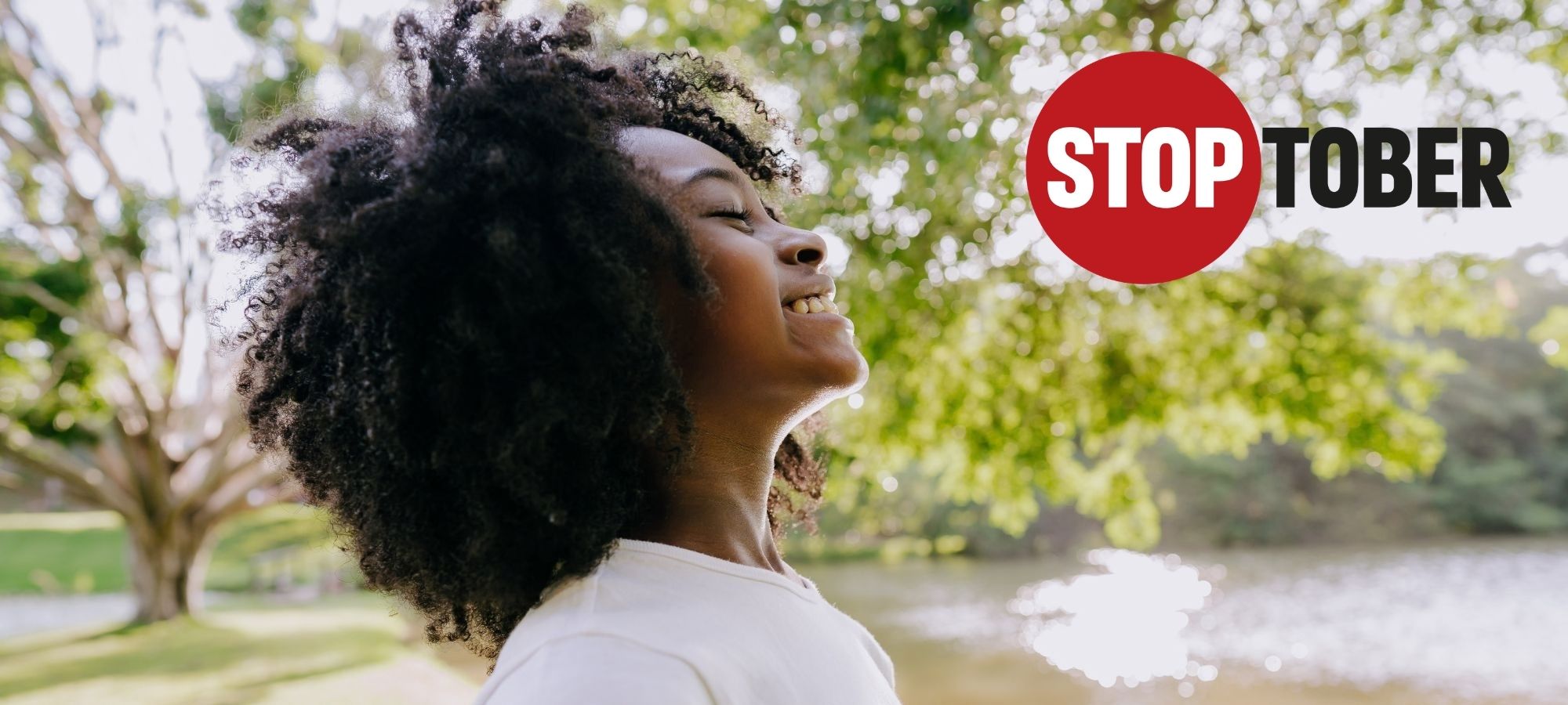 Woman breathing fresh air with Stoptober logo