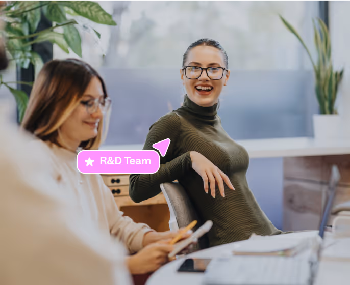A Sales lead and client shaking hands in an office, illustrating a successful partnership.