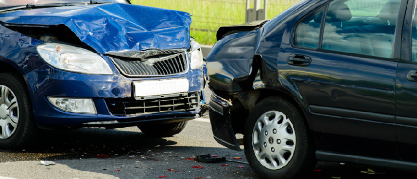 Rear-End Collision Between Dark Blue and Black Cars on Detroit Outskirts