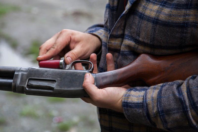 A person with a gun