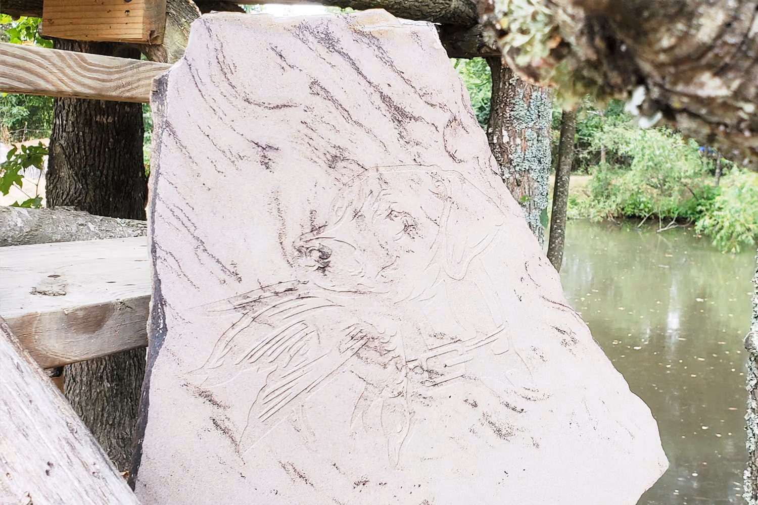 Engraved Stone with dog sign