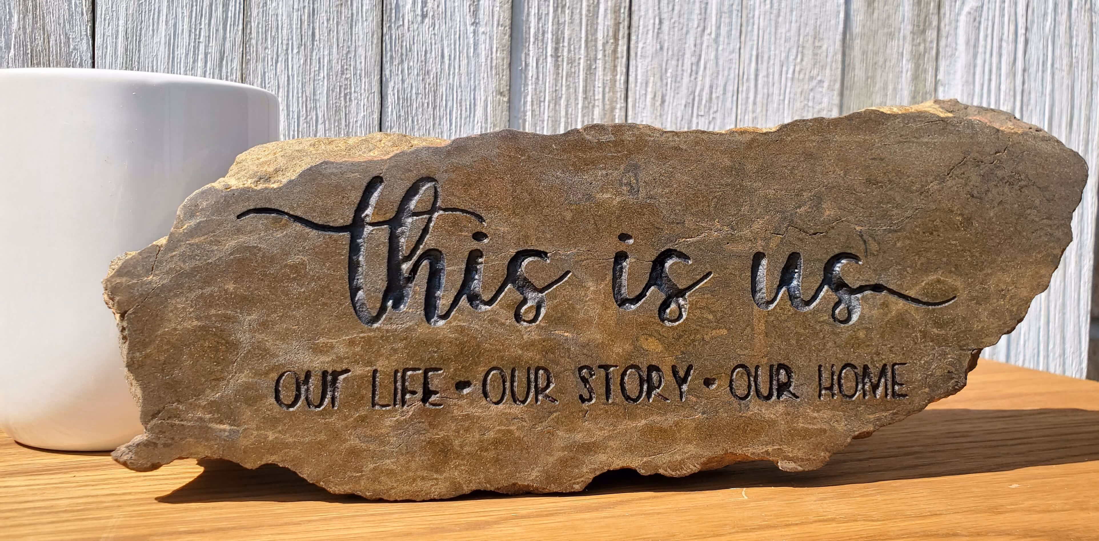 Engraved Stone with phrase This is Us, Our Life Our Story Our Home sign
