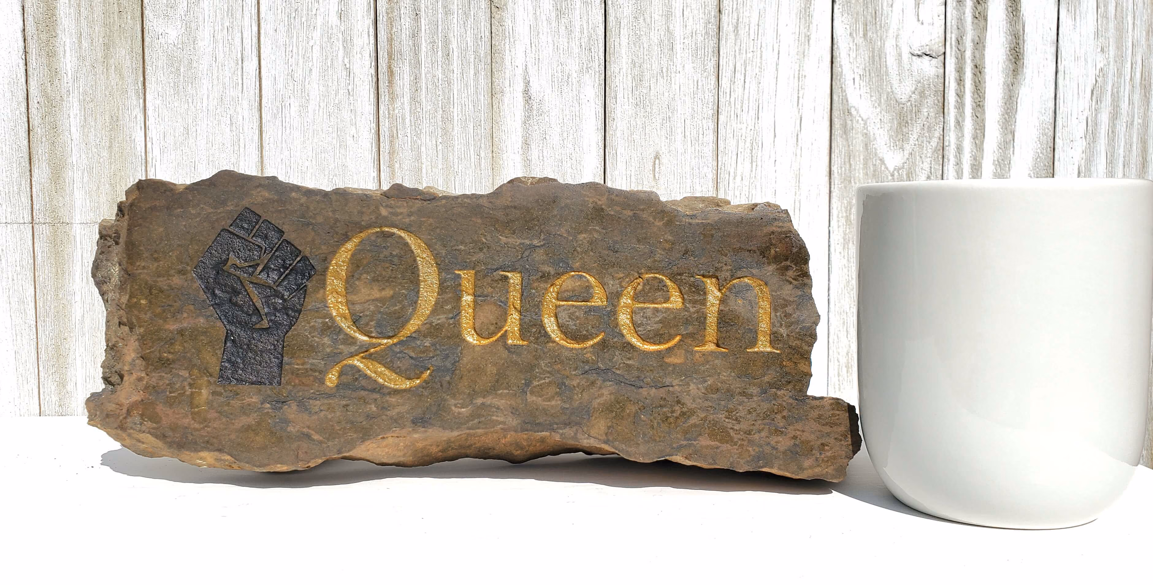 Engraved Stone with Queen sign