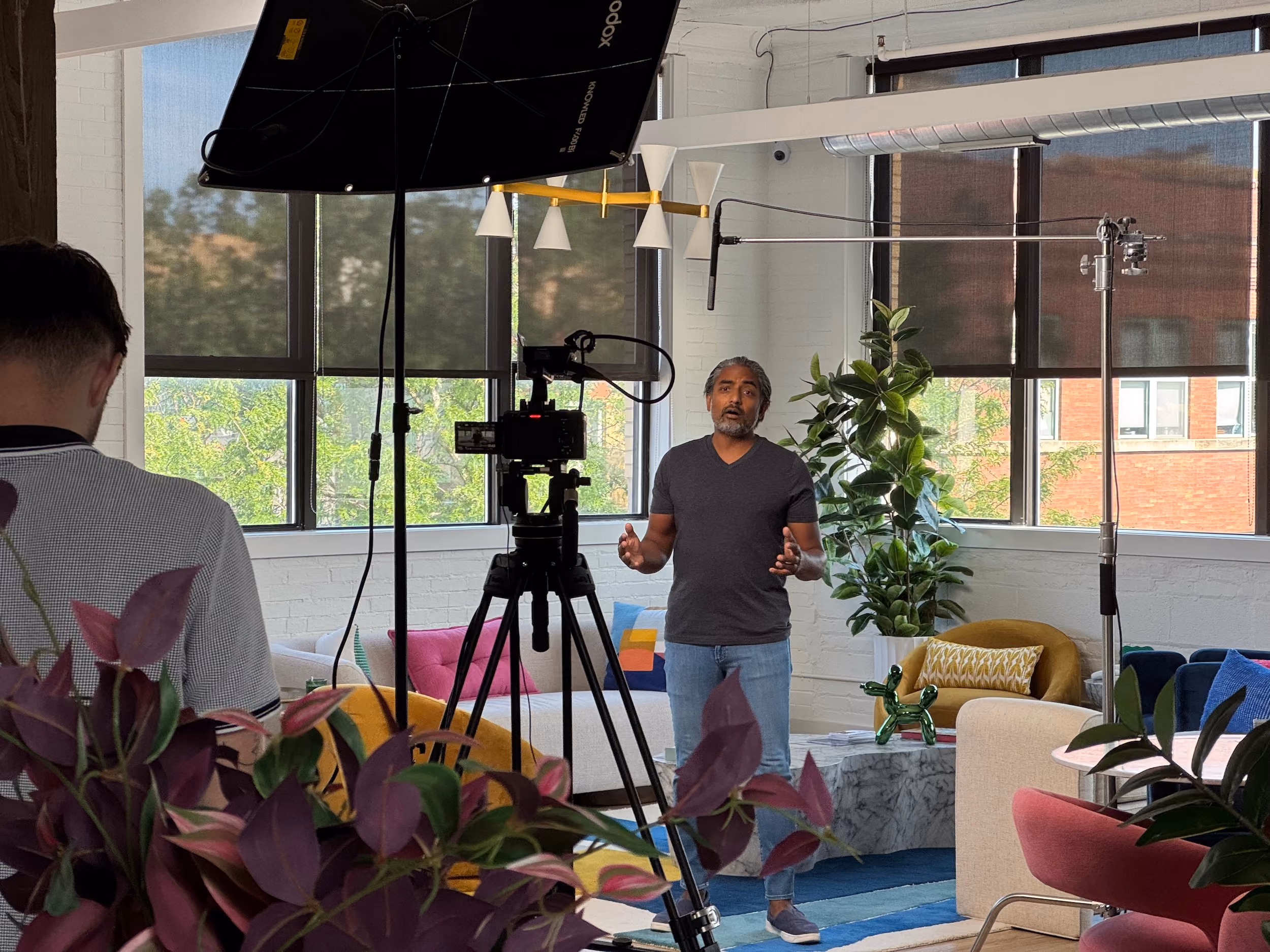 Behind the scenes of a video shoot at Precision Social.