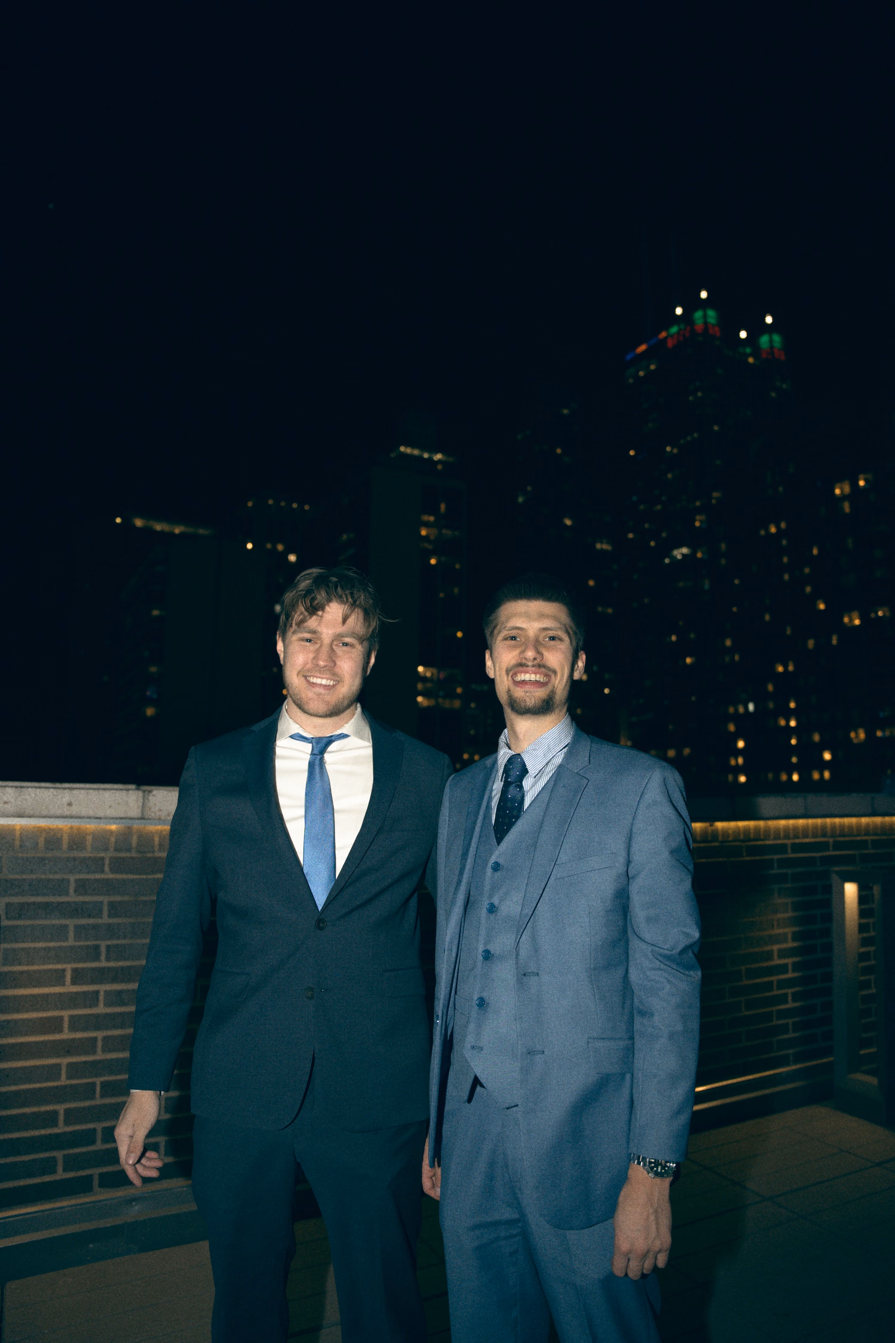 Gabriel Burch and Chase Pickett, founders of Precision Social, stand for a photo in Chicago