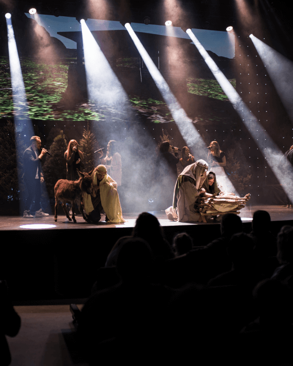 Stage with people portraying the birth of Jesus Christ