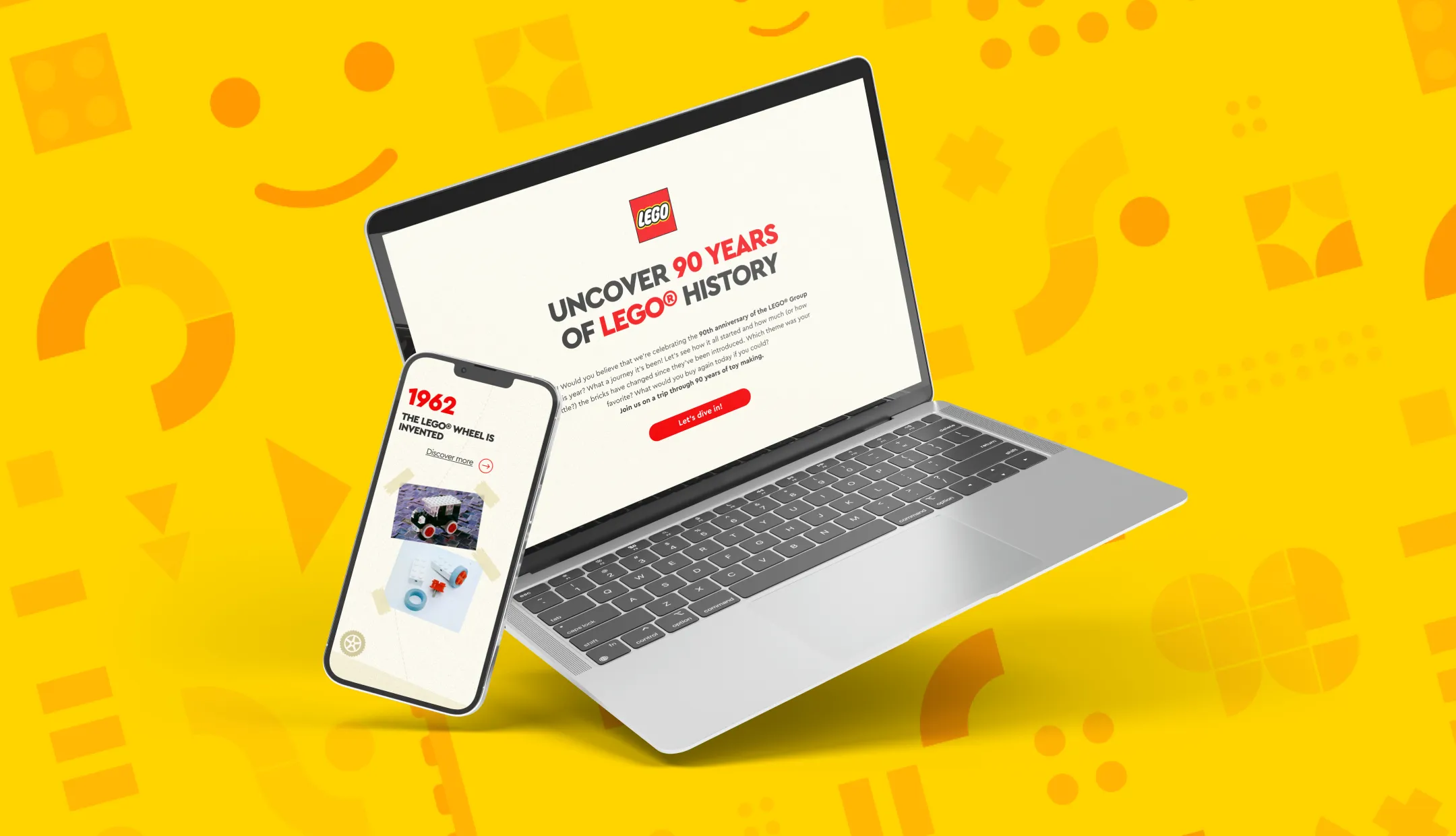 An interactive webpage displayed on a laptop and smartphone, inviting users to explore 90 years of LEGO history, featuring a bright yellow background with LEGO bricks and a timeline that users can scroll through.