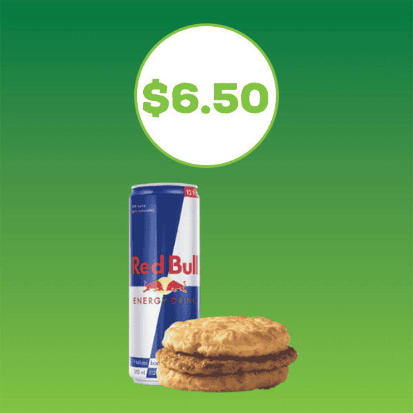 A sausage biscuit and a can of Red Bull