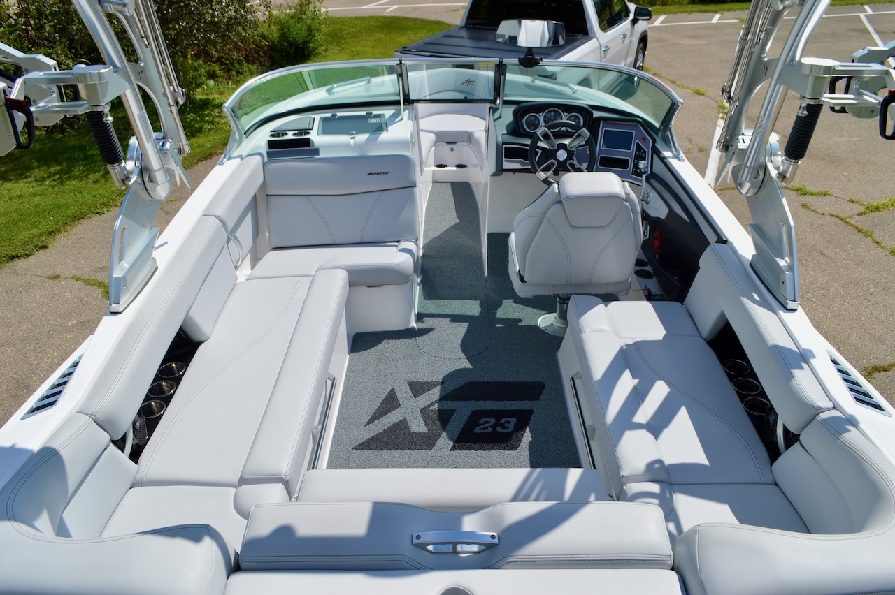 2020 Mastercraft XT23 | Redline Watersports | For Sale in Madison WI | Cockpit view with gray vinyl