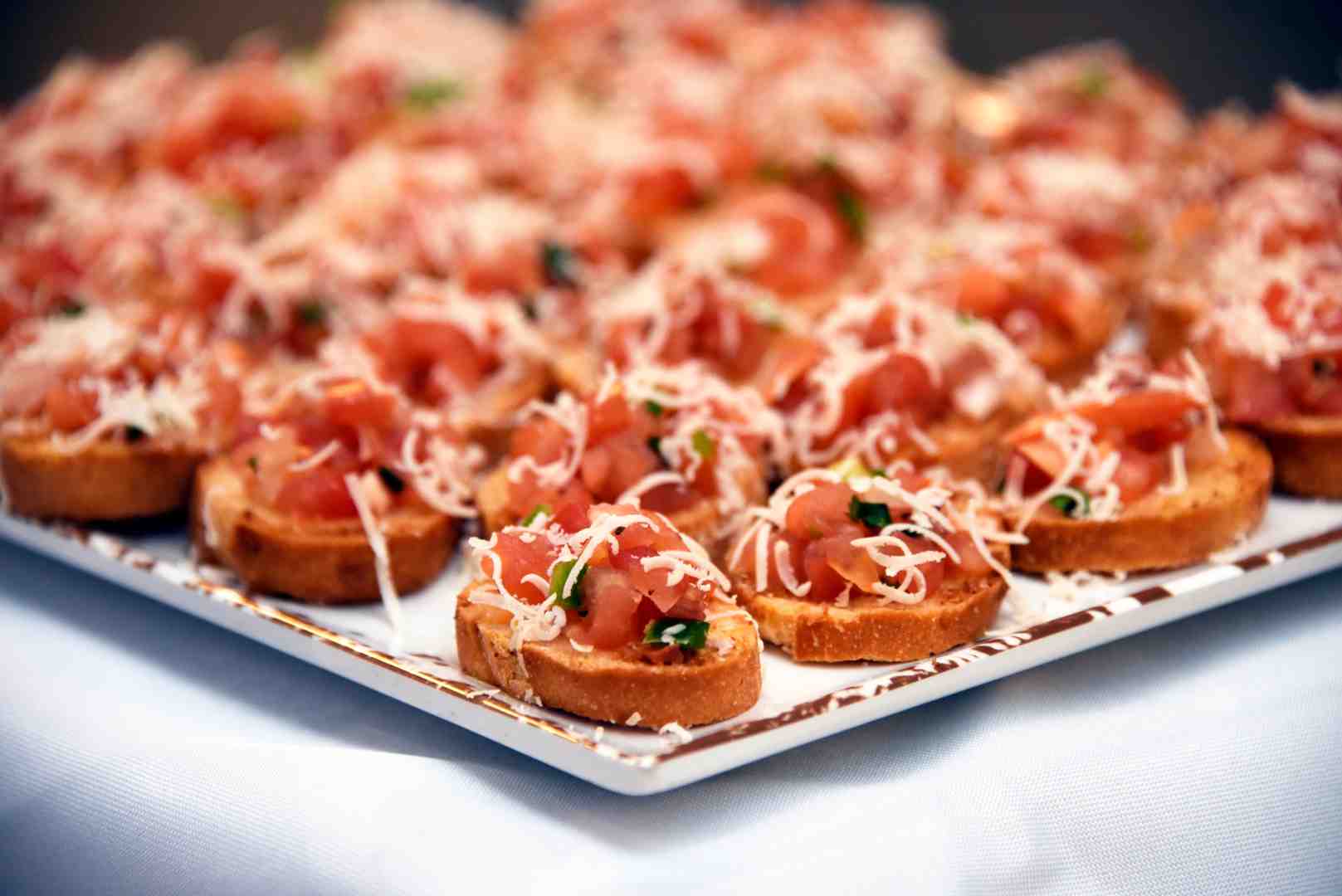 elegant canapes at a catered event with finger foods and upscale presentation
