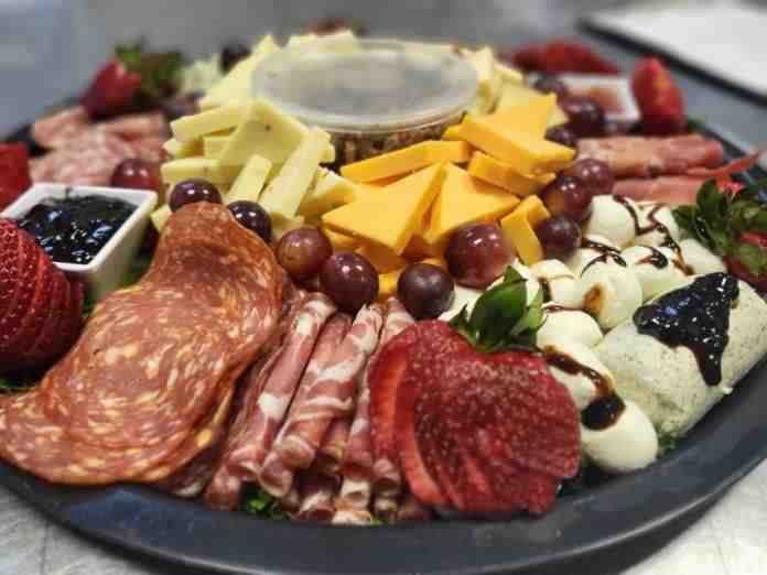 beautifully arranged cold canapes on a serving platter beautifully arranged cold canapes on a serving platter