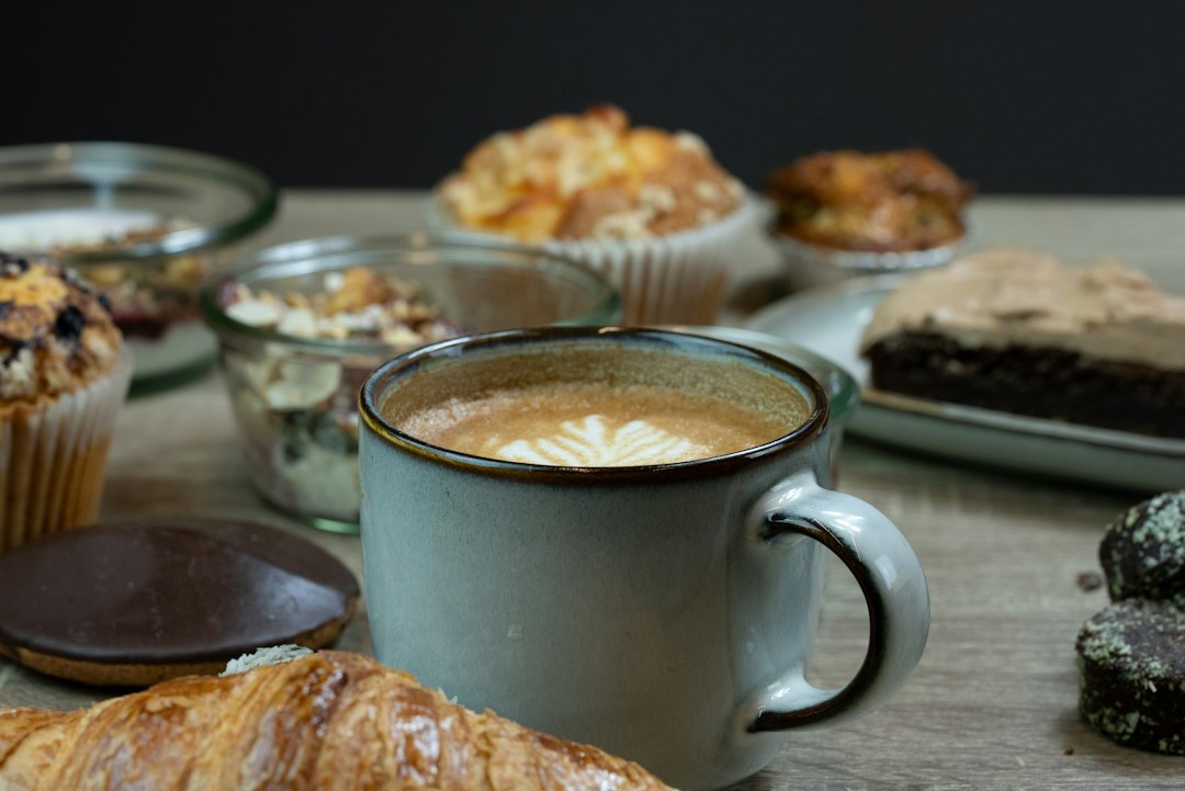 Assorted breakfast pastries and fresh coffee tote setup