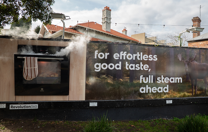 Special build 3D microwave with steam coming out in a billboard