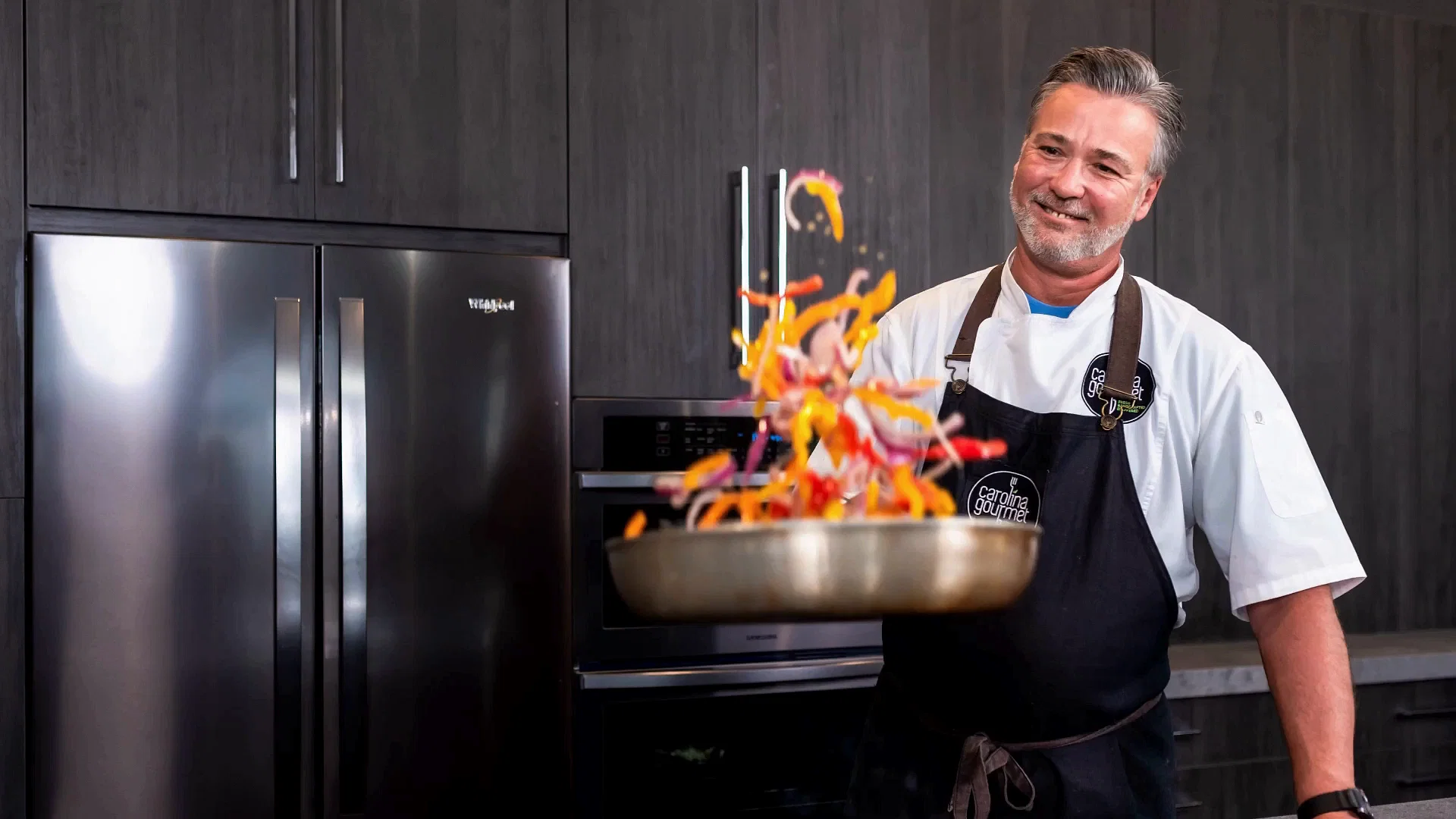 Peter Olsacher hosting a private chef meal at a lake side house in Lake Norman, NC