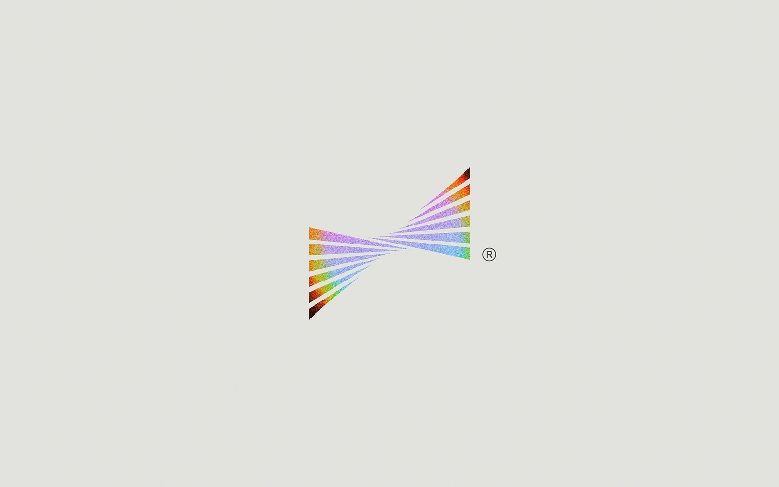 Multicolor geometric fan-shaped mark on an off-white background.