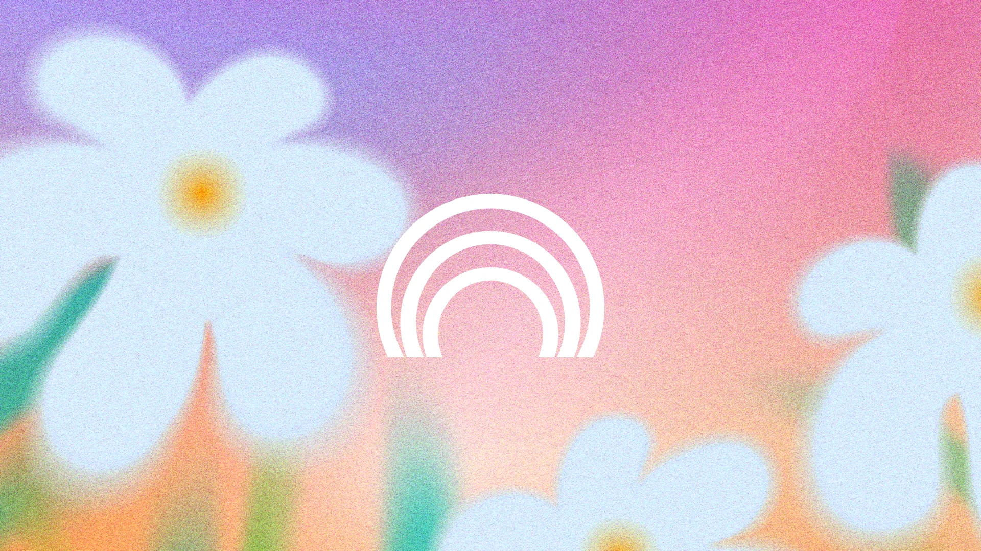 White rainbow mark surrounded by soft blue flowers against a grainy pink and orange sky.