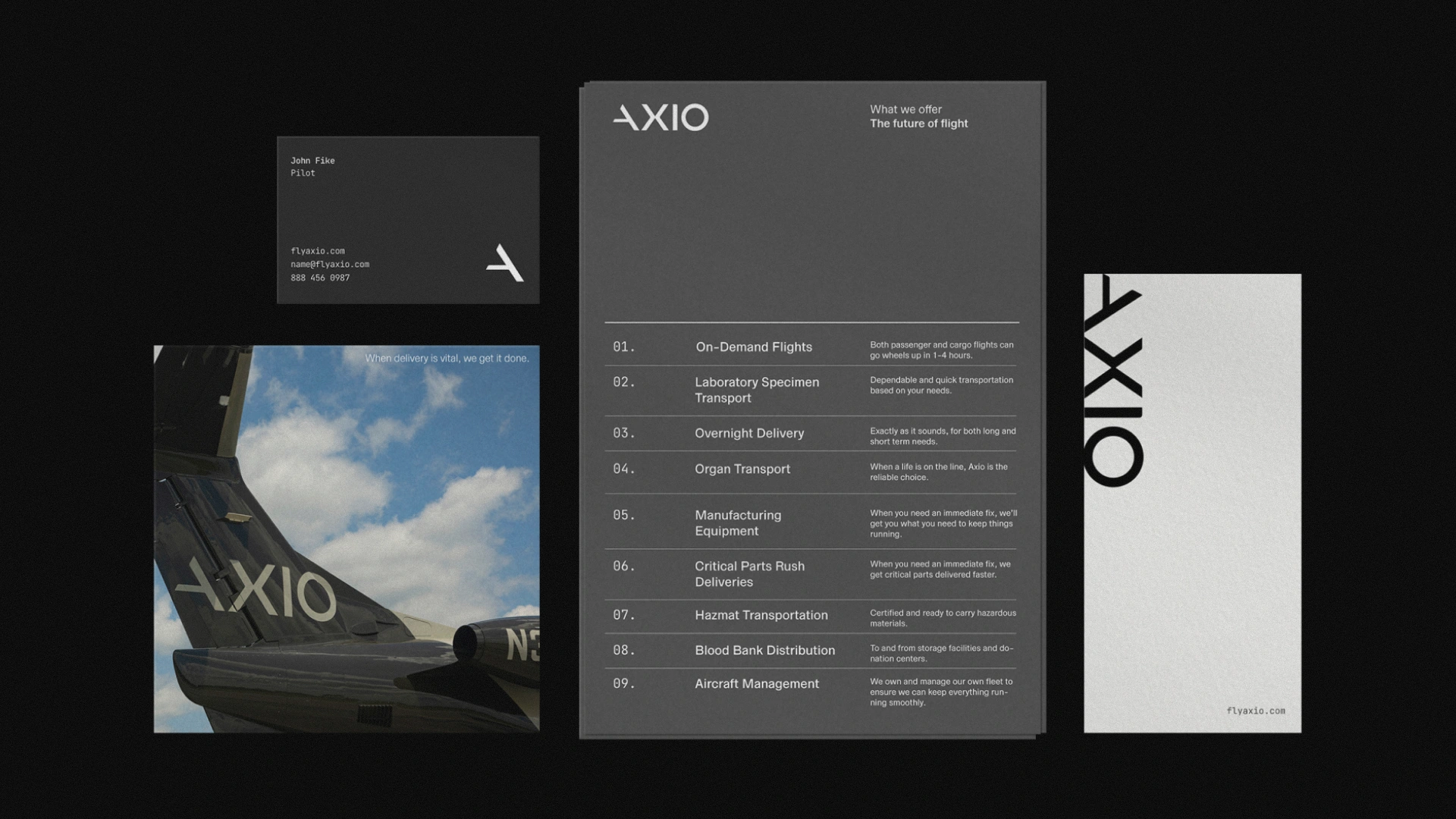 Axio stationery collection with a business card, aircraft imagery, service details, and a branded document.