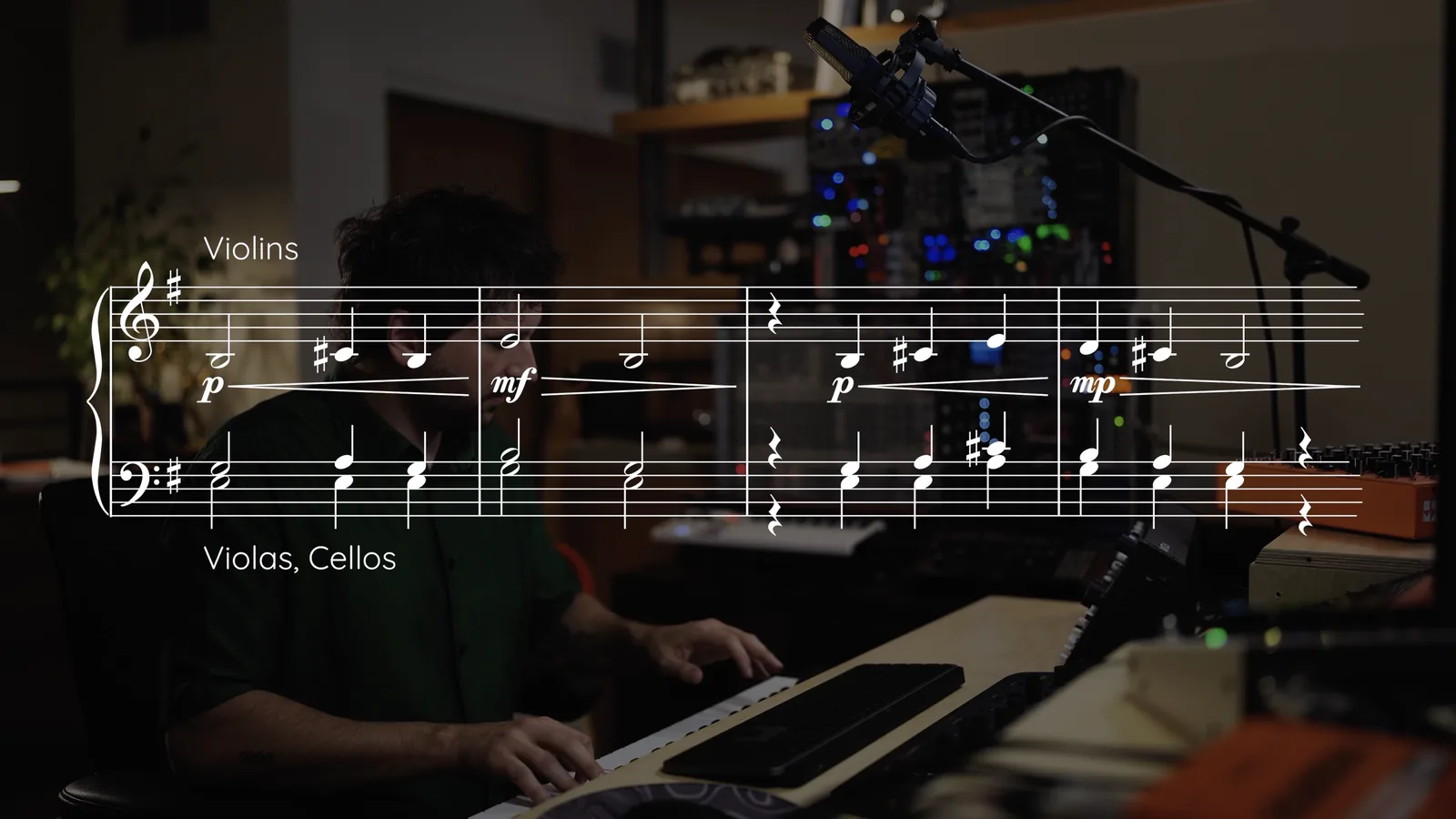 Adam Lukas at the keyboard with an orchestral notation overlay for violins, violas and cellos