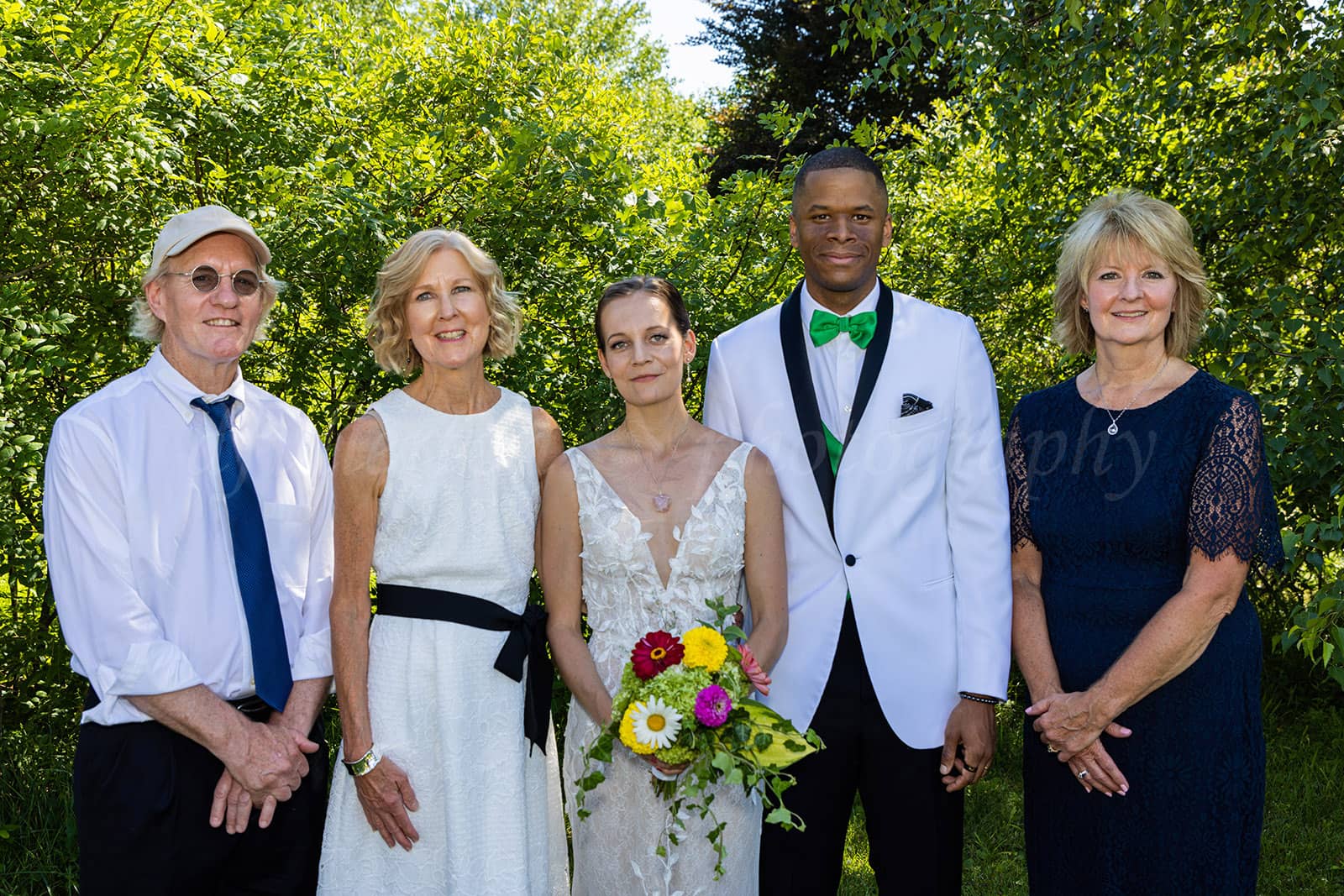 Wedding group photo at Michigan Arboretum and Botanical Gardens, Ann Arbor, MI by Fullerton Photography.