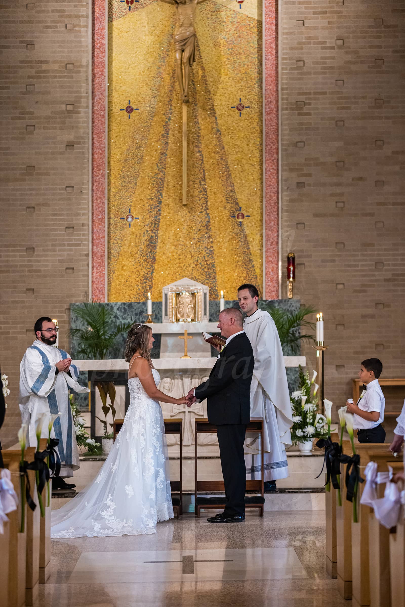 Wedding Photo at St. Joseph Catholic Church, Howell, MI by Fullerton Photography.