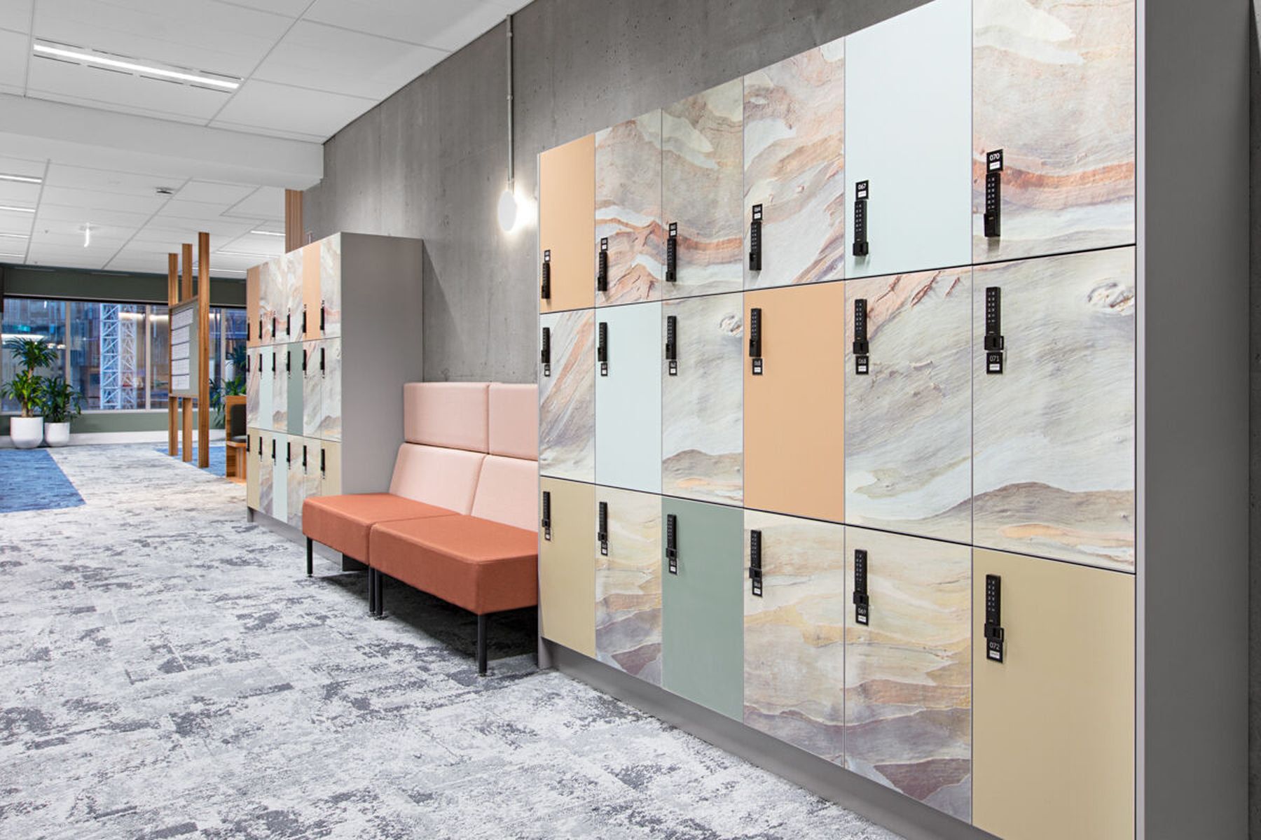 Office lockers wrapped in printed marble-effect graphics