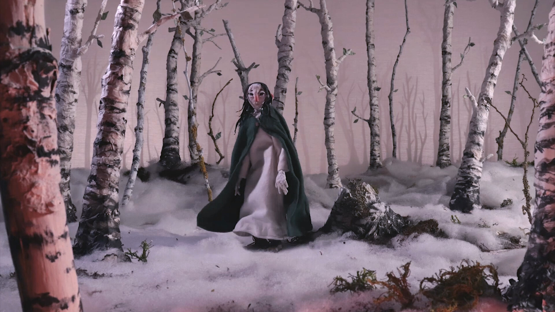 A lone figure walking through a misty birch forest in Hazy Eyes