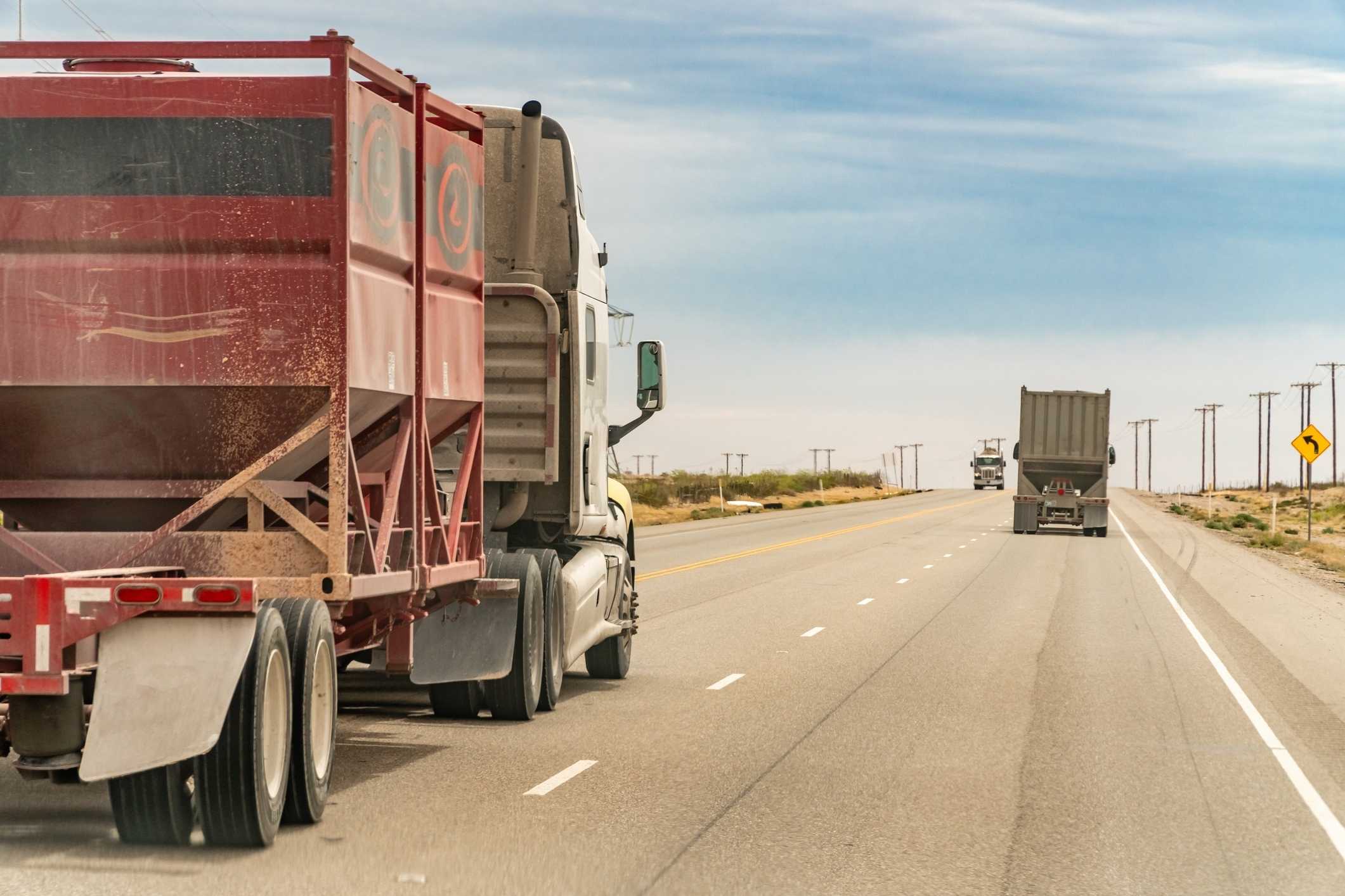 Commercial trucks on a Texas road, representing a Missouri City truck accident lawyer case.