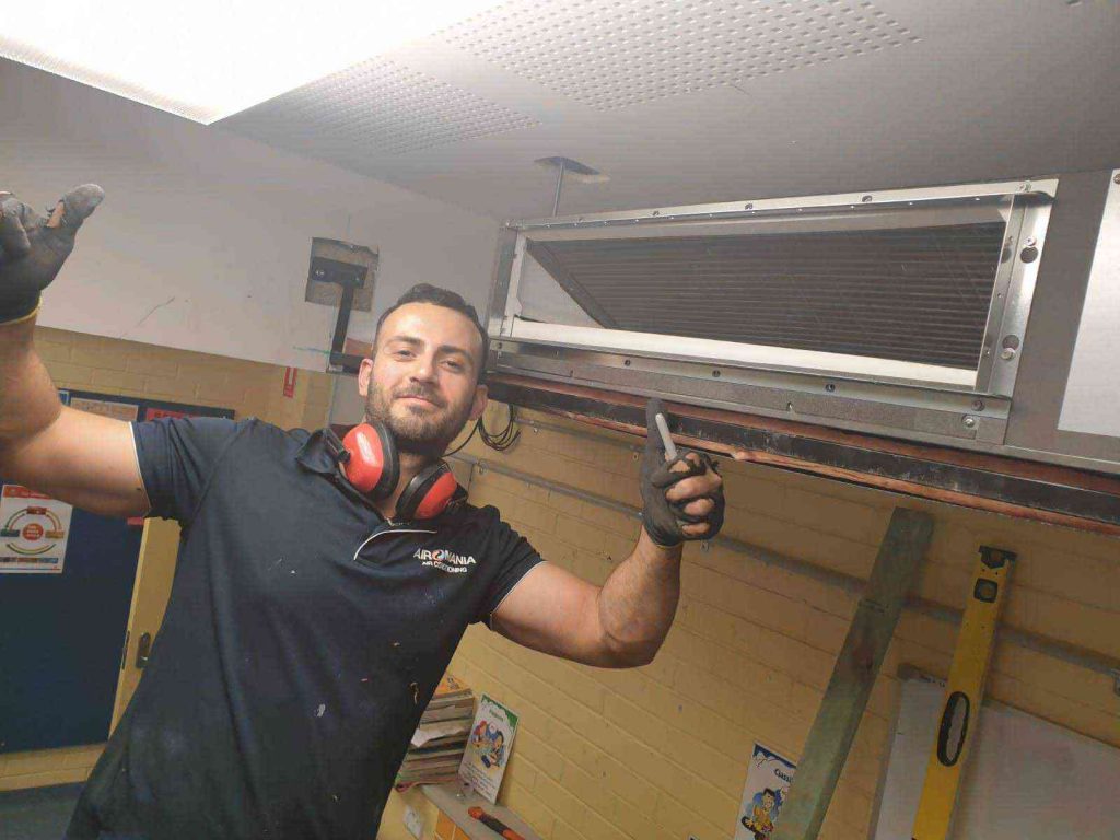 Happy Airomania technician at work