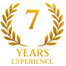 Gold laurel wreath encircling the number 7 above the text 'YEARS EXPERIENCE' in gold letters.