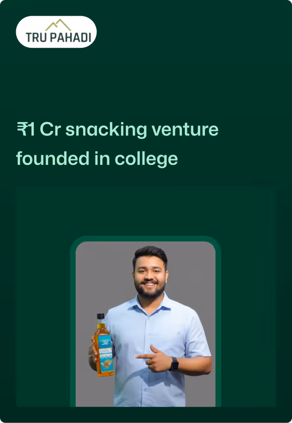 Smiling man holding and pointing to a bottle of snack oil with Tru Pahadi logo and text about snacking venture.