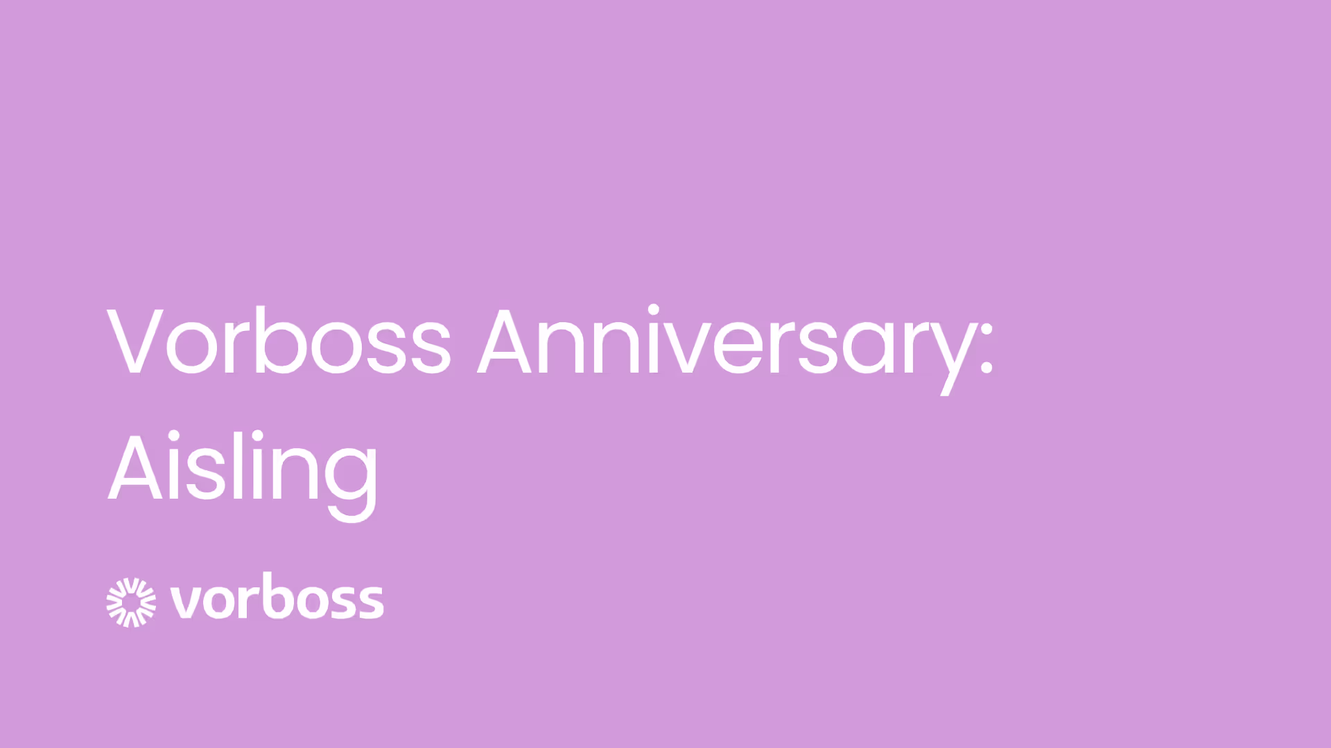 Cover image with pink background and the Vorboss logo plus text saying Vorboss Anniversary: Aisling.