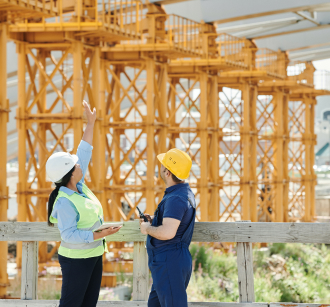 Workers looking at a roof