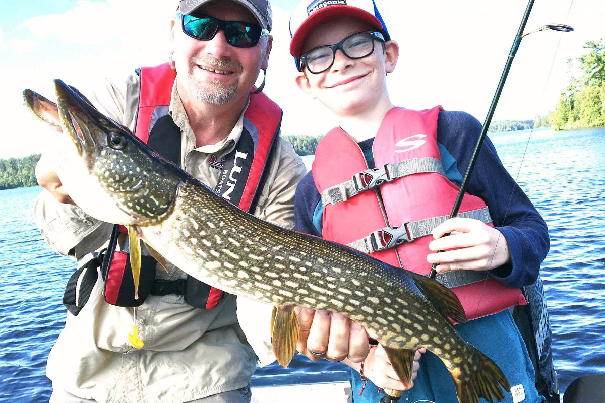 Group fishing with a guide on lake vermilion
