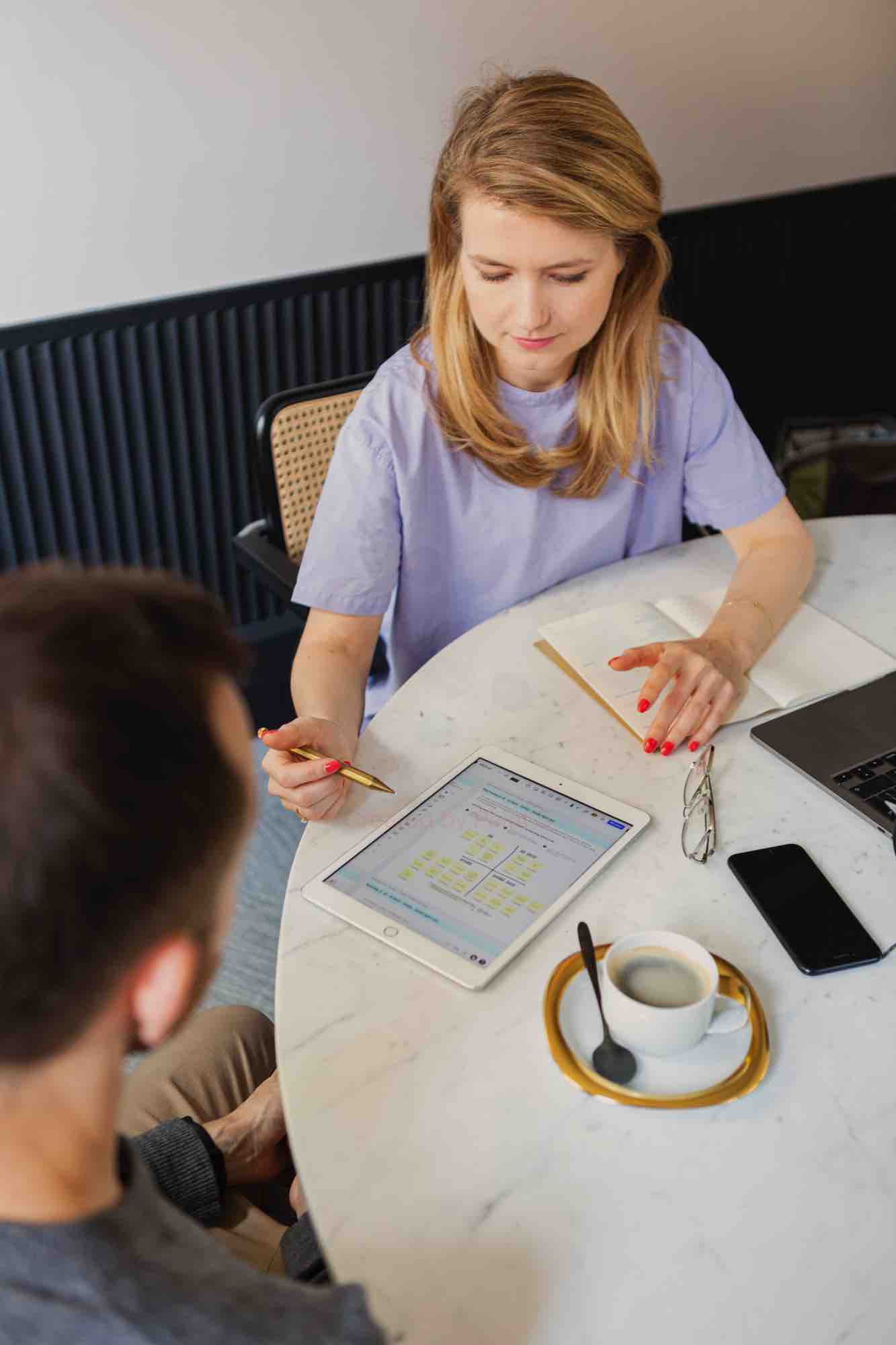 Olive colored soap in wooden soap dish