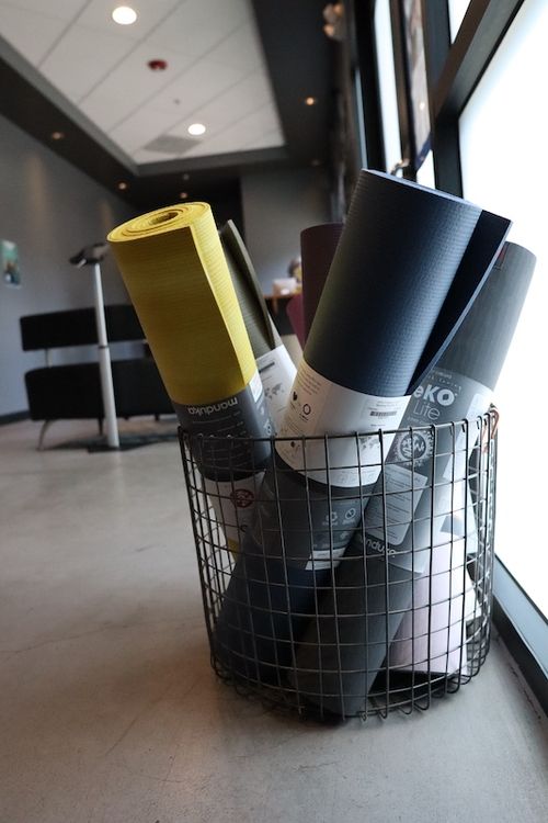 Yoga mats rolled up inside Pleasanton Studio
