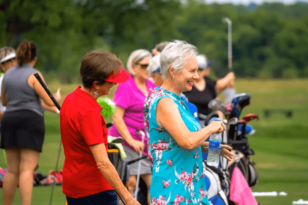 Women enjoy watching golf